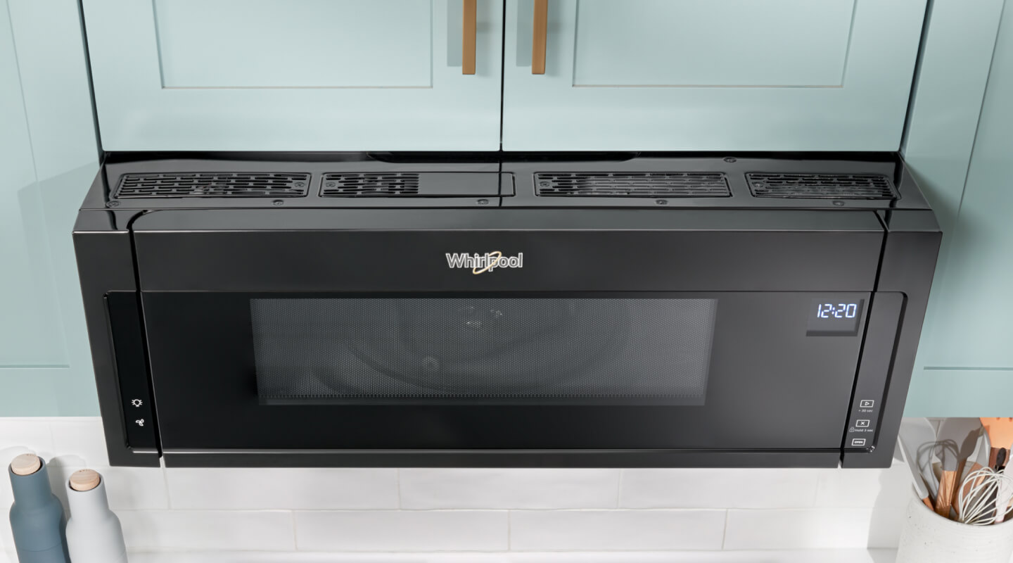 Whirlpool® low profile microwave in a bright kitchen