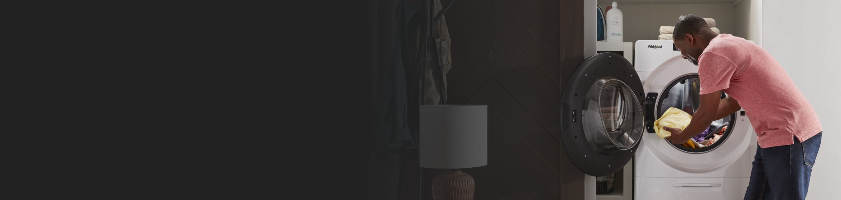 A person loading laundry into a Whirlpool® All-In-One Washer Dryer Combo