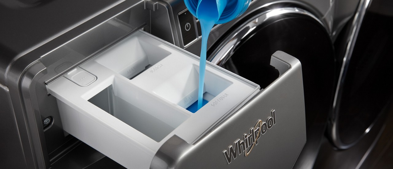 Detergent and fabric softener dispensers in a washer Detergent and fabric softener dispensers in a washer