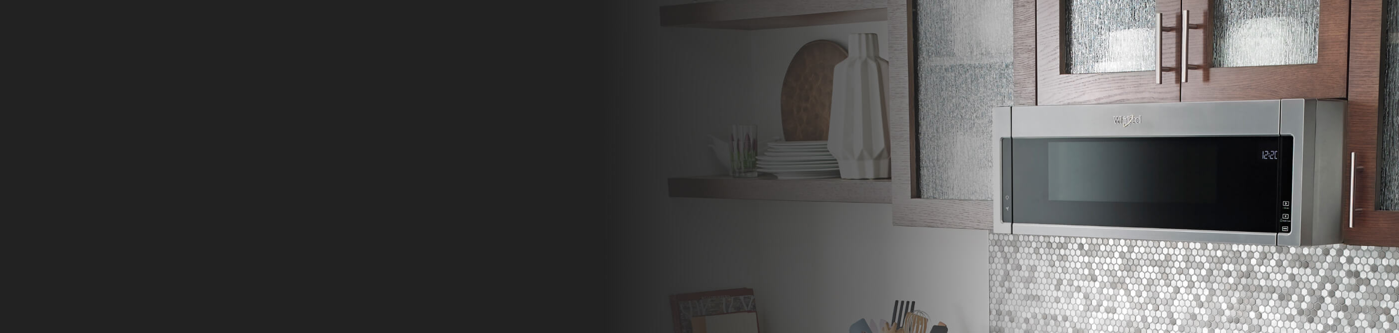 Whirlpool® Microwave set in brown cabinetry