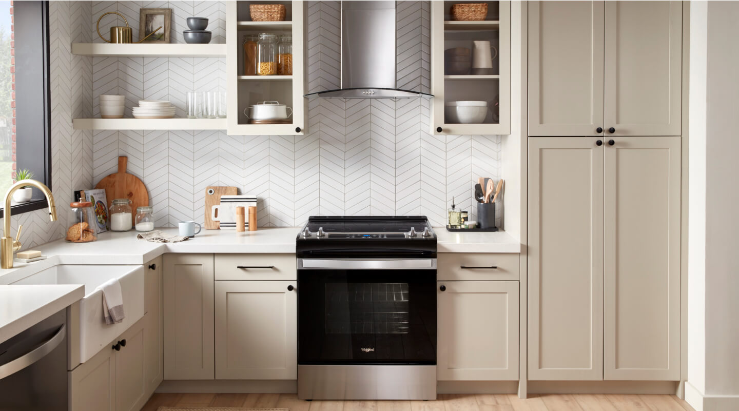 Wall-mount range hood over an electric range