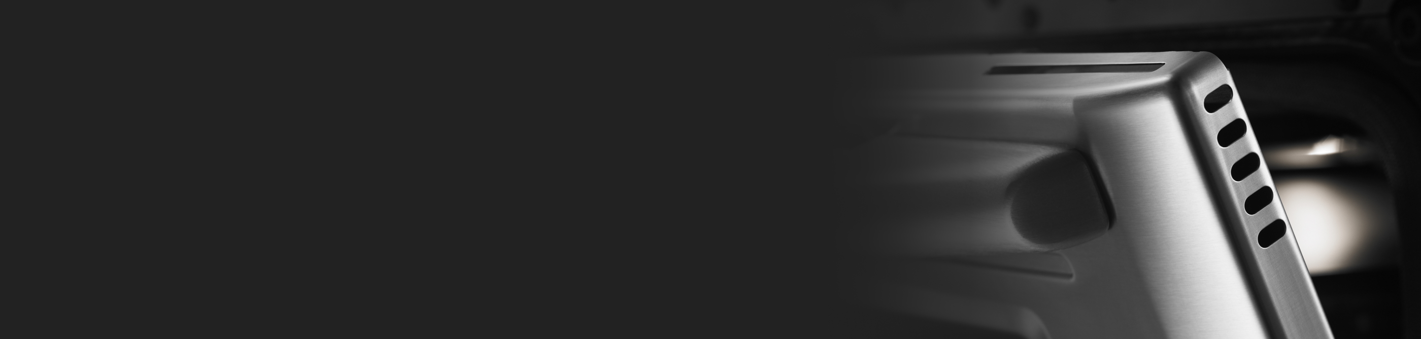 Close-up of an oven door slightly open