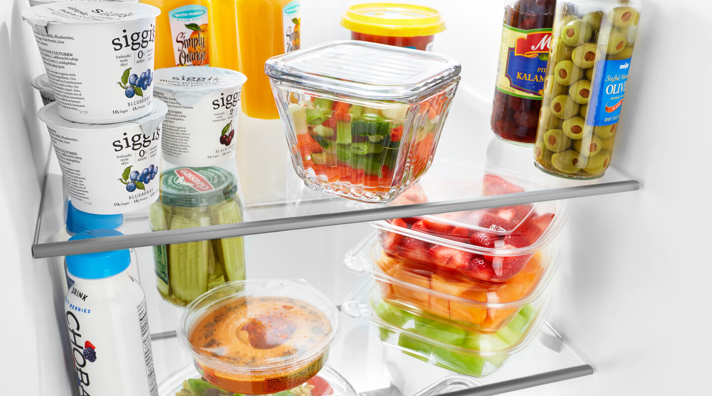 Stocked refrigerator shelves