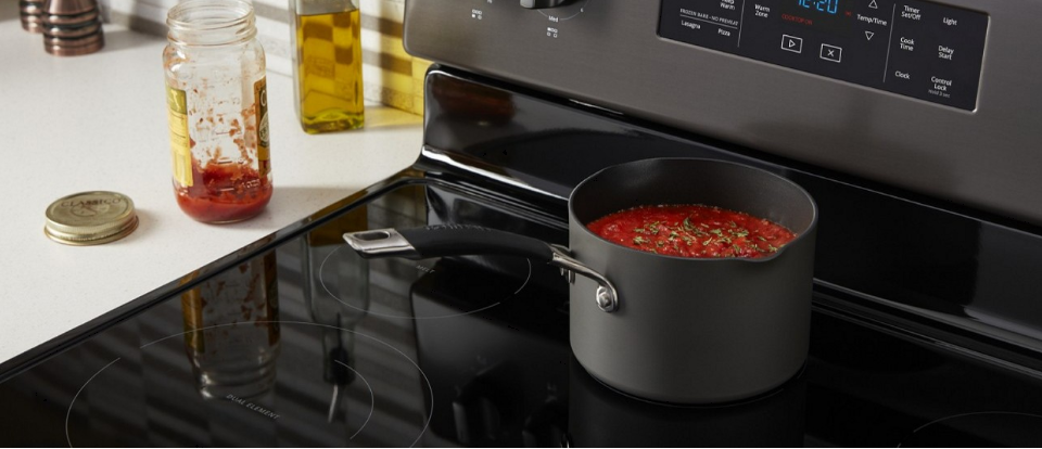 Spaghetti sauce in a pot on a cooktop
