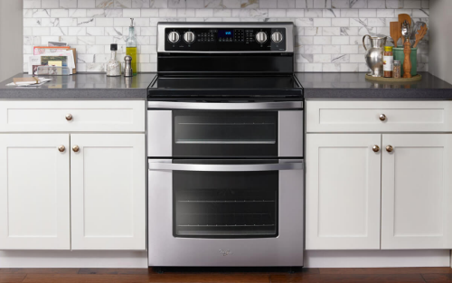 Whirlpool® range set in white cabinetry