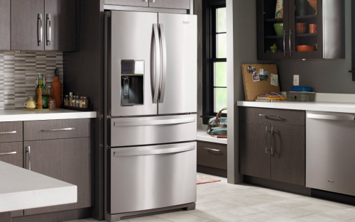 Stainless steel Whirlpool® French Door Refrigerator in brown cabinetry