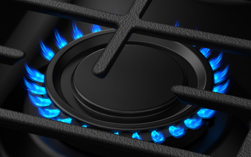 An activated burner on a gas range