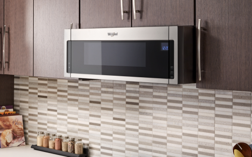 Whirlpool® Low Profile Microwave in brown cabinetry