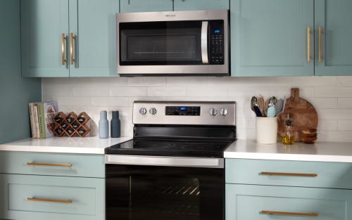 Microwave and oven in kitchen