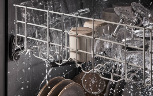 Glasses being washed in dishwasher