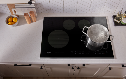 Aerial view of a Whirlpool® 5-burner gas range.