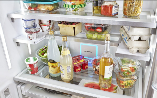 A refrigerator with a Whirlpool® Fresh Flow Refrigerator Air Filter