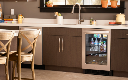 Interior of a kitchen with an undercounter fridge installed