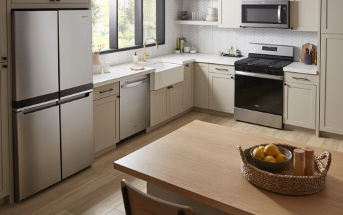 Whirlpool® 4-Door Refrigerator in a bright kitchen