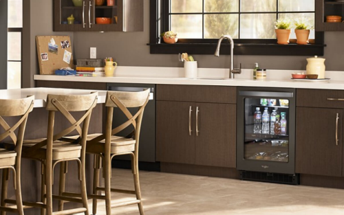An undercounter refrigerator with beverages inside