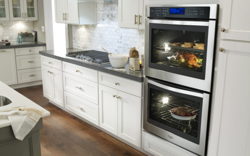 Whirlpool® double wall oven in a white modern kitchen