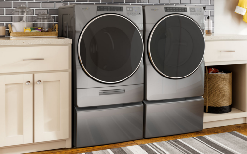 A Whirlpool® Washer and Dryer in a laundry room