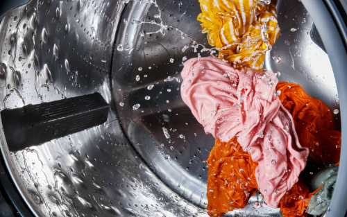  Clothes getting washed in a Whirlpool® Washing Machine