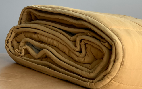 A folded down comforter 