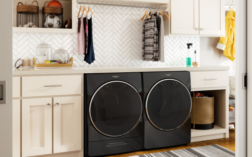 A washer and dryer set in a laundry room