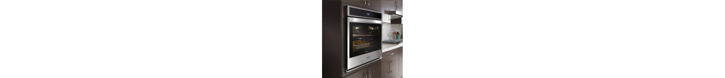  A stainless steel wall oven installed at counter height