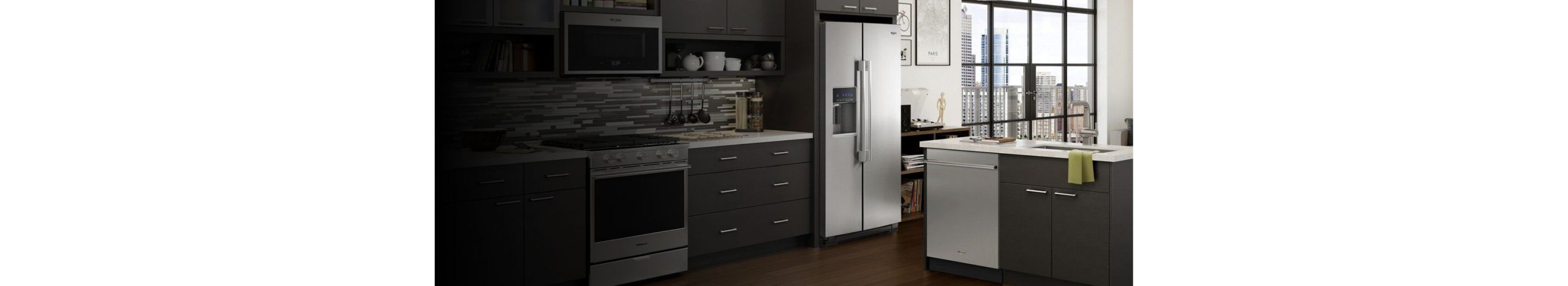 A full Whirlpool® kitchen suite with range, microwave refrigerator and dishwasher