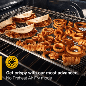 Whirlpool oven interior with crispy fries and tacos cooking on an air fry basket, promoting No Preheat Air Fry mode