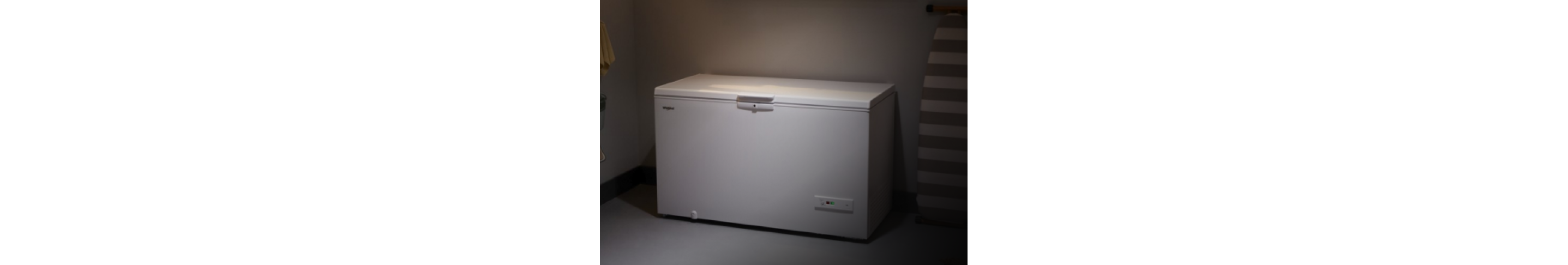 A Whirlpool® Deep Freezer in a garage