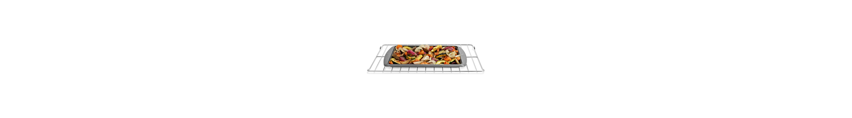 Roasted vegetables in pan on oven rack