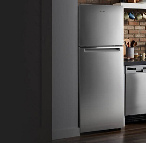 Stainless steel Whirlpool® Top Freezer Refrigerator in compact kitchen