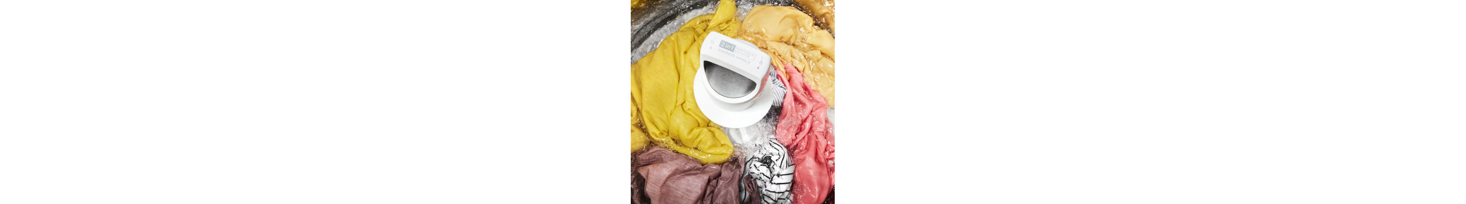 Clothes going through a rinse cycle in a washer