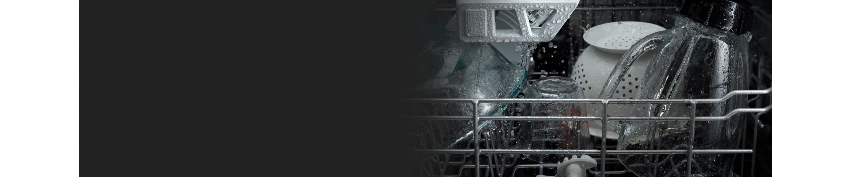 Dishes in dishwasher during wash cycle