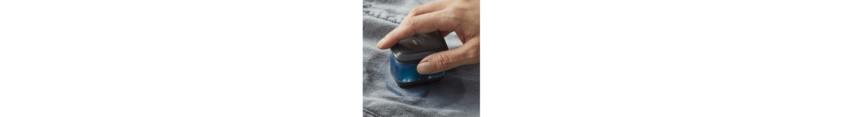 Person applying detergent to clothing