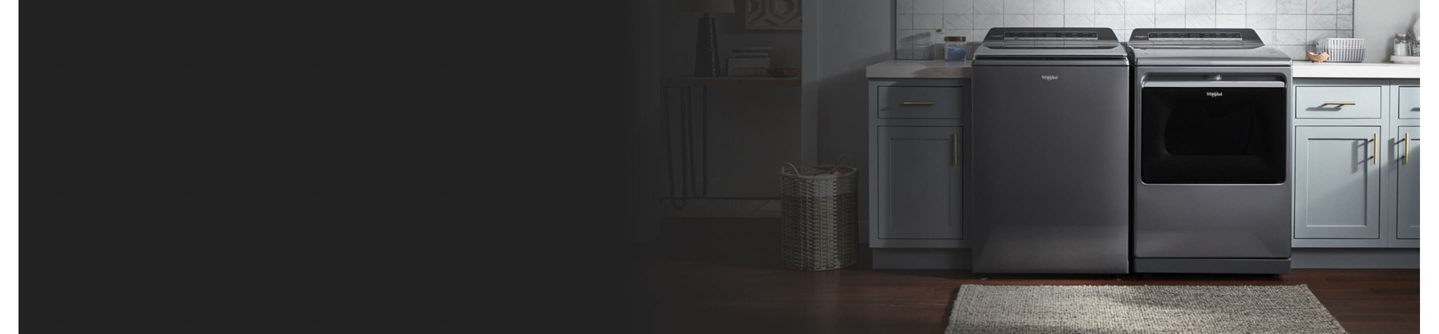A grey Whirlpool® Top Load Washer and Dryer set