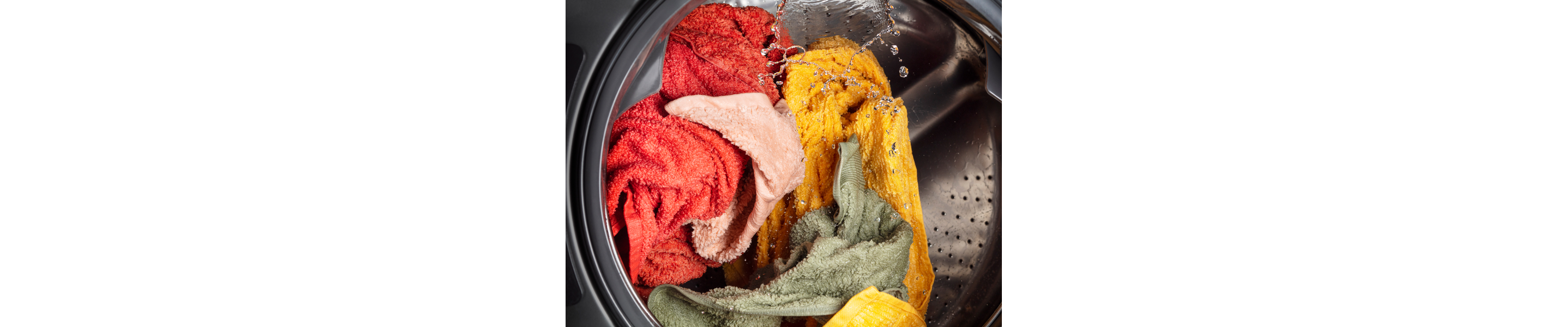 A load of towels in the midst of a spin cycle
