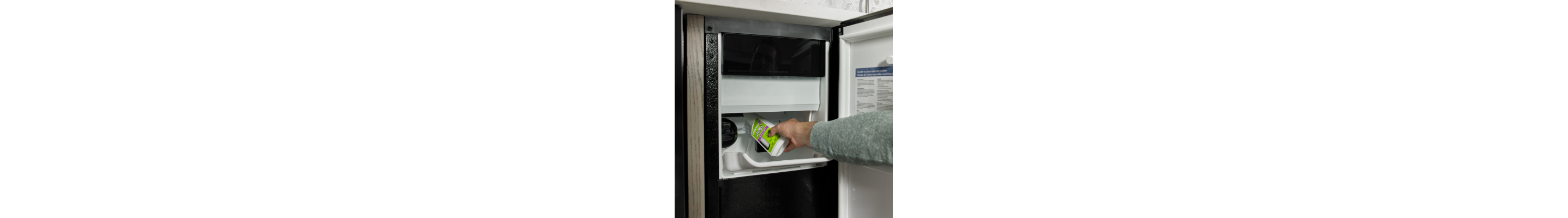 Person pouring affresh® ice machine cleaner into an icemaker