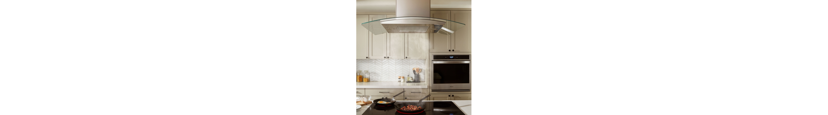Canopy vent hood over a island cooktop