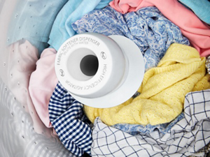 Clothes inside a top loading washing machine