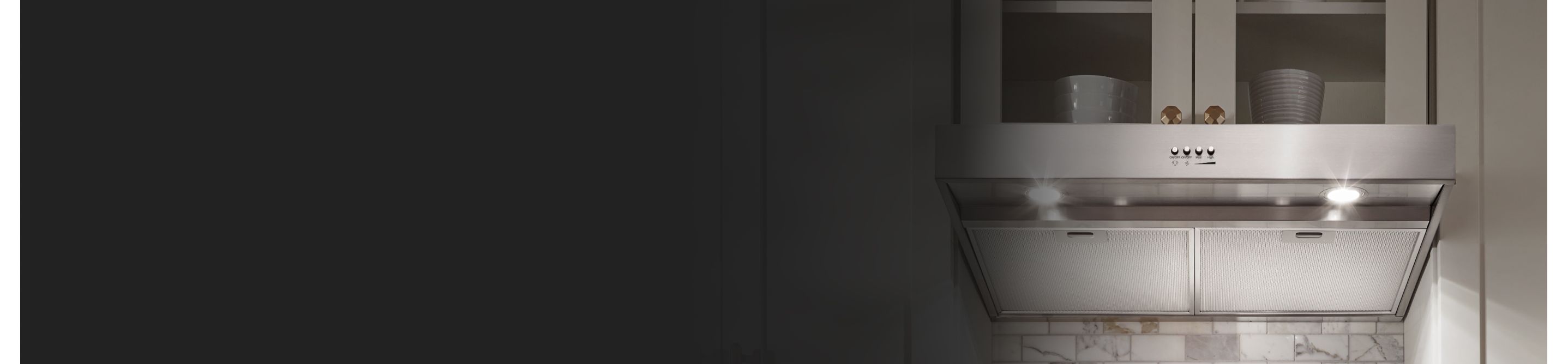 Stainless steel range hood under a cabinet