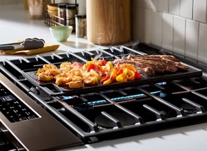 Food cooking on a griddle on a Whirlpool® Range