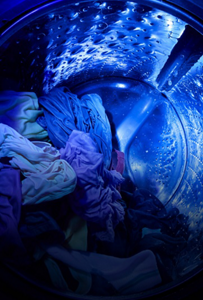 The inside of a washing machine with UV light